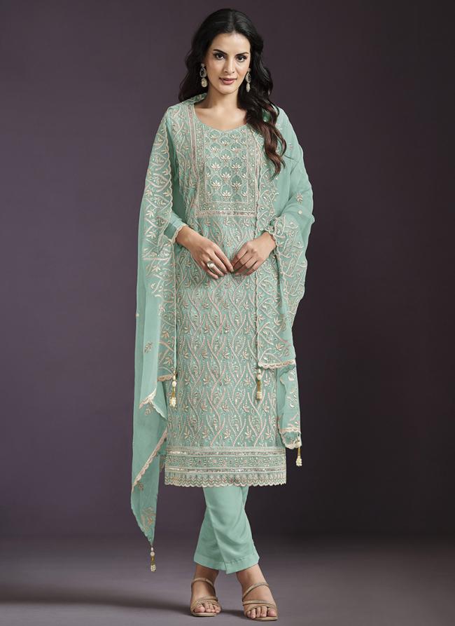 Chinnon Silk Teal Ceremonial Wear Embroidery Work Dress Material